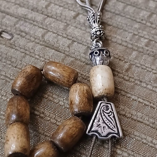 Worry beads made of bone used with oriental elements