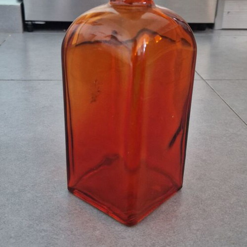 Decorative orange square bottle like new