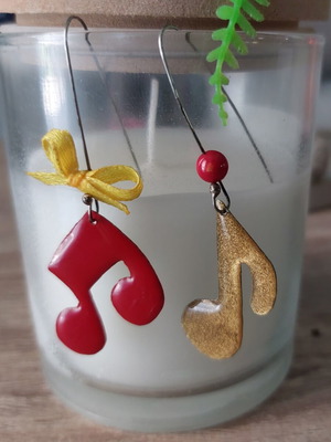 Handmade earrings with metal notes, acrylic colors, and resin, like new