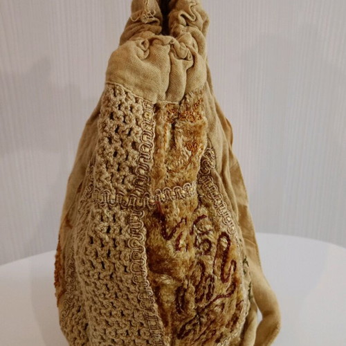 Mini fabric backpack used