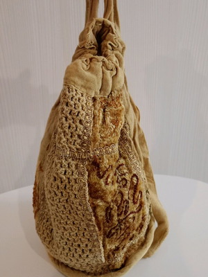 Mini fabric backpack used