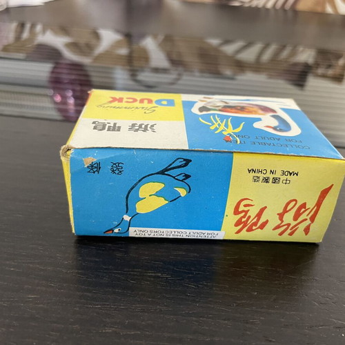 Tin duck vintage toy used with original box, Chinese made