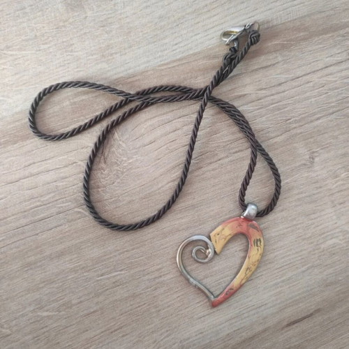 Heart pendant with long cord and metal gold heart like new