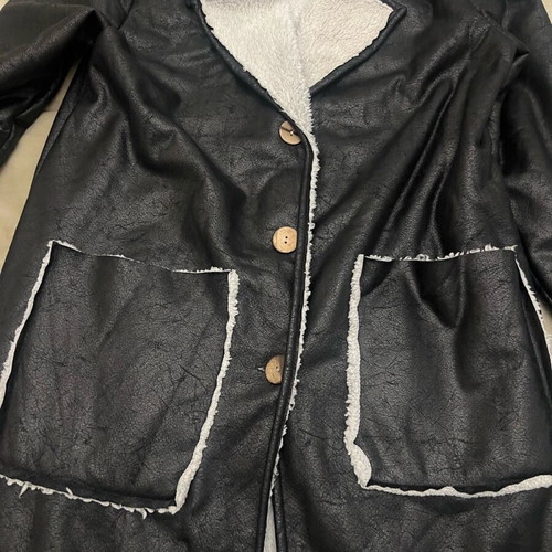 Women's mouton coat used black with white fur and wooden buttons