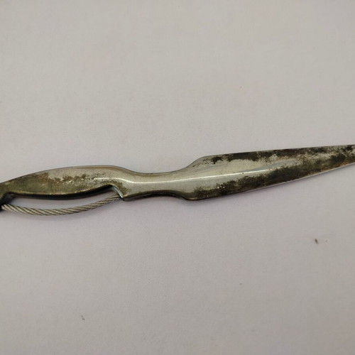 Vintage metal letter opener with unique handle