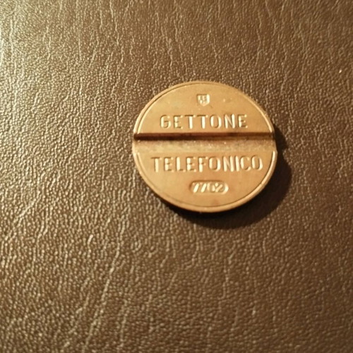 Telephone coin like new 7702