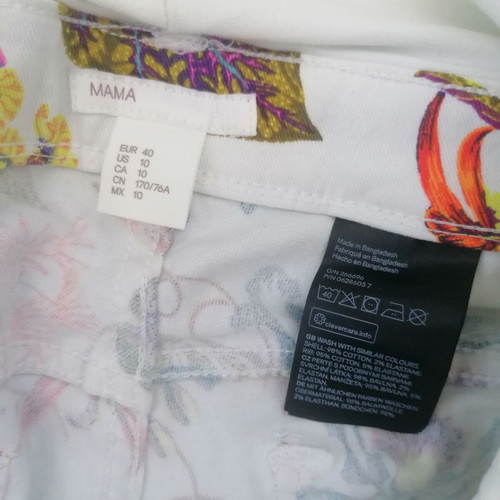 Maternity shorts with floral design by H&M, like new