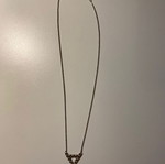 Triangle necklace used, silver color