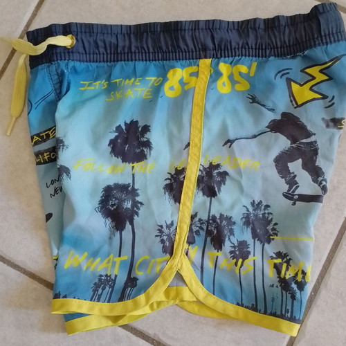 Losan boys' swim shorts used, size 104 cm, blue and yellow, skate theme