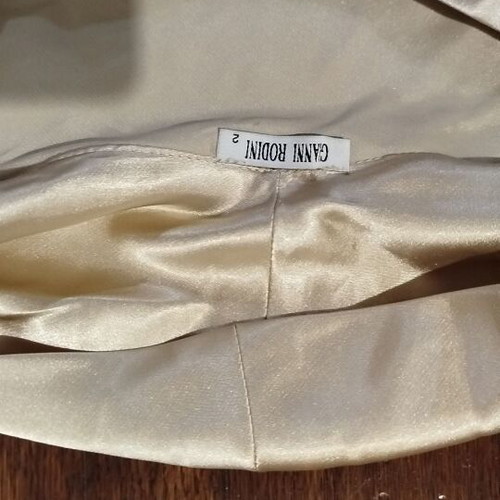 Satin sleeveless blouse size M like new, beige