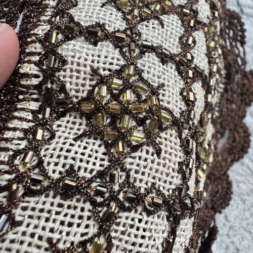 Vintage coasters used with lace and decorative beads in brown-bronze