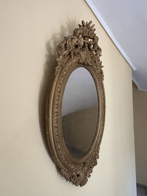 Baroque oval wall mirror with carved plaster frame, used, 104×61 cm