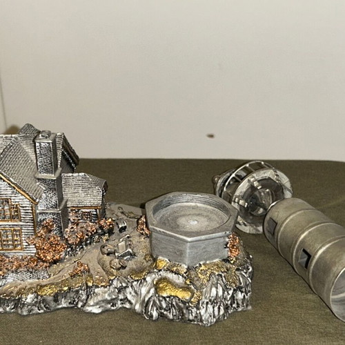 Vintage metal lighthouse decorative miniature with hidden compartment, like new
