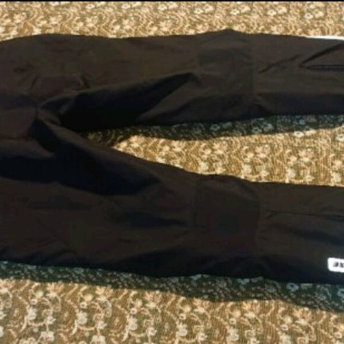 Dainese women's motorcycle pants like new with D-Dry membrane and protectors