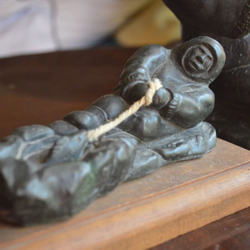 Three Inuit figurines used, indigenous Eskimo creations from Canada