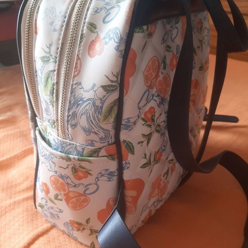 Axel backpack with quilted texture and citrus pattern, like new