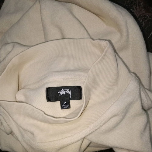 Unisex Stüssy cream mock neck sweatshirt used with embroidered logo