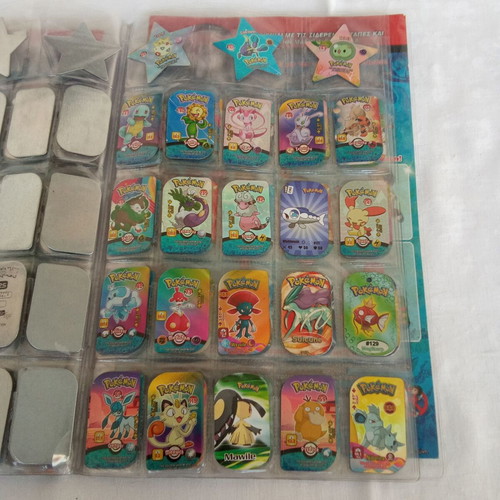 Collectible album with 132 Pokemon metal tags