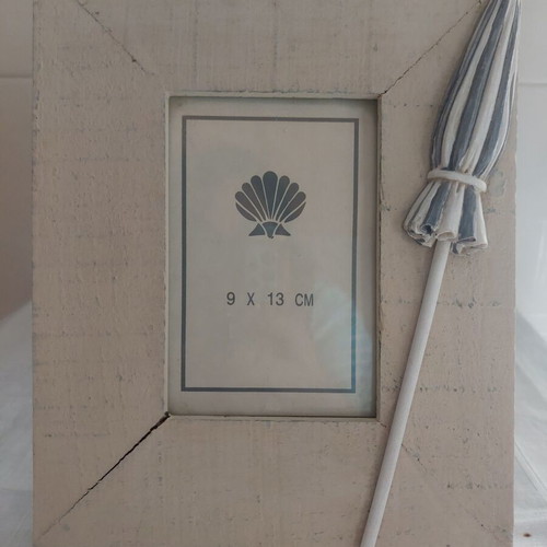 Large wooden frame with handmade umbrella decor like new