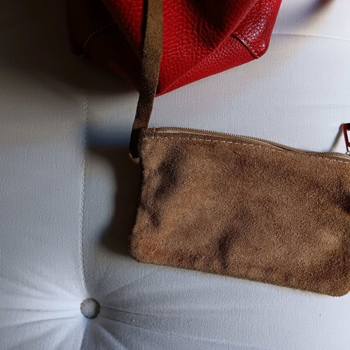 Red leather shoulder bag used with detachable wallet