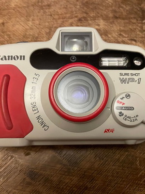 Vintage waterproof Canon WP-1 camera used