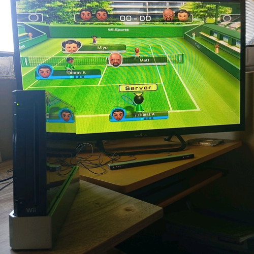 Nintendo Wii black used with Wii Motion Plus controller, nunchuk and 2 games