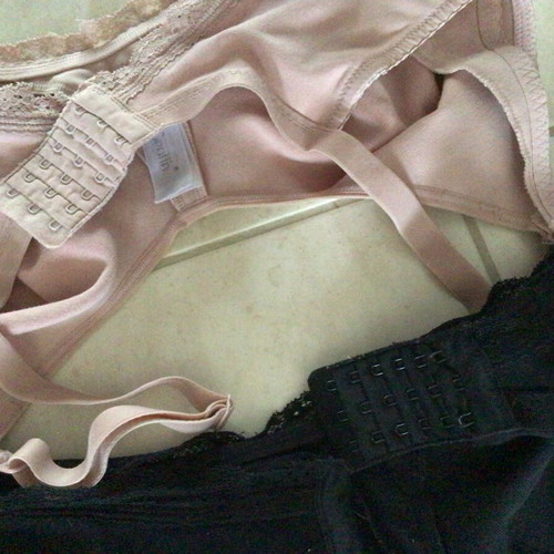 Nursing bras like new, sizes 85E and 85D, black and salmon