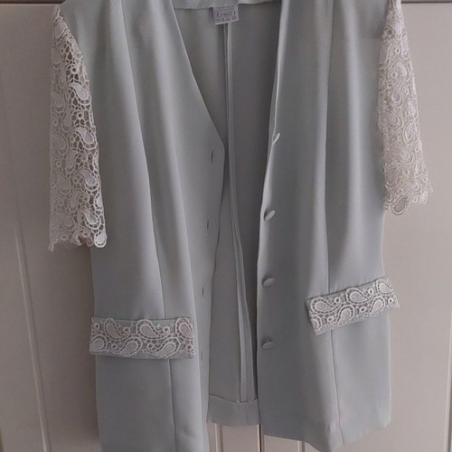 Women's jacket with lace sleeves used, size 50