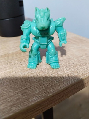 Teratomachos miniature used with cut on left arm