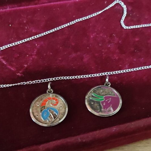 Zodiac Aries and Taurus enamel necklace set like new