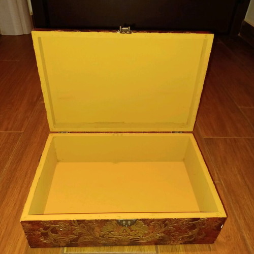 Wooden antique box used with embossed bronze decorations