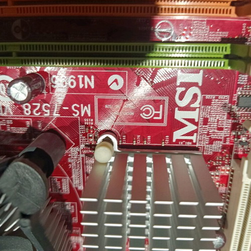 MSI G31M3-F motherboard used with Intel processor and heatsink