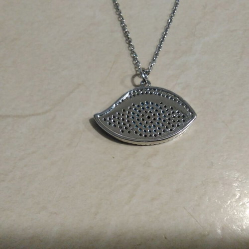 Women's necklace with turquoise and silver lucky eye design, like new
