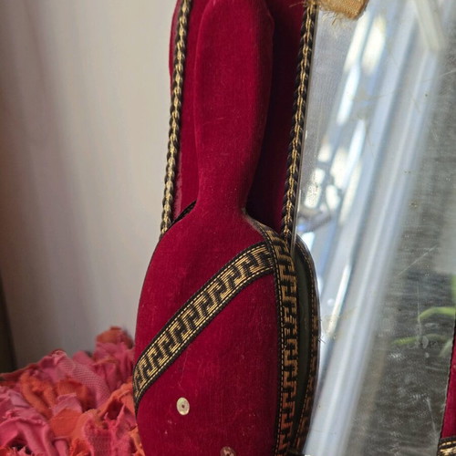 Antique mirror with velvet frame and doll, used 1950-1965