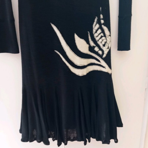 Dress black with white thin wool like new, tight fit