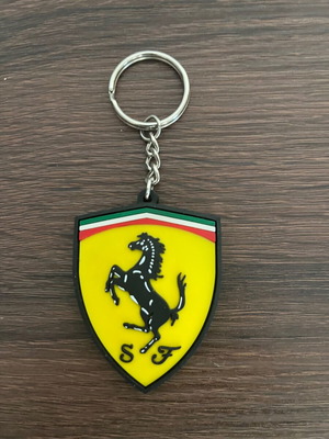Ferrari official keychain like new, plastic, black