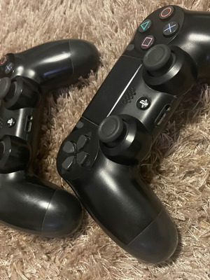 PlayStation 4 Slim μεταχειρισμένο με 2 χειριστήρια, 9 παιχνίδια, 500GB SSD