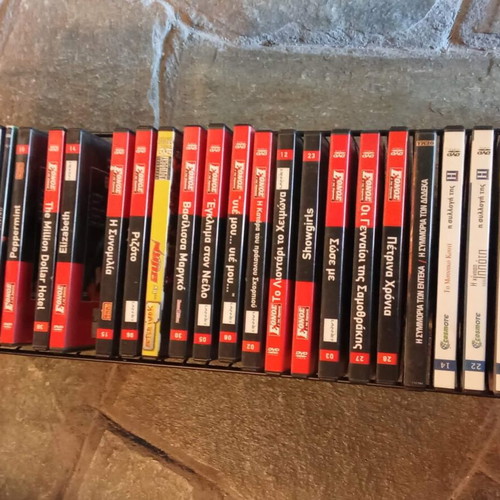 DVD set of 32 like new, various genres with subtitles