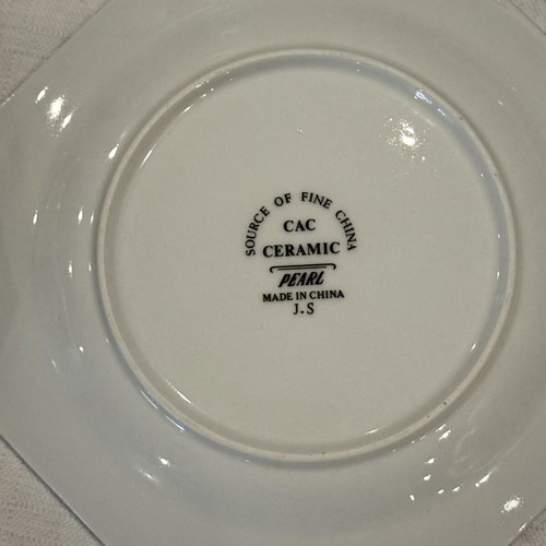 Vintage porcelain 37-piece dinnerware set with floral design