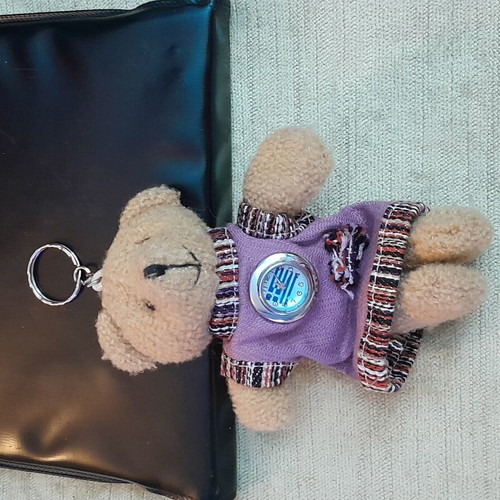 Bear keychain with digital watch used