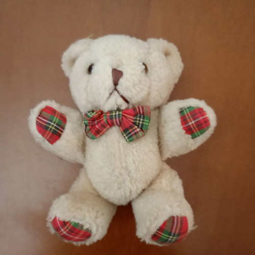 Plush teddy bear with plaid bow tie like new