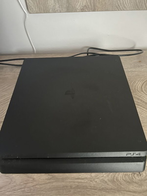 PS4 console like new 1TB with 4 games and controller