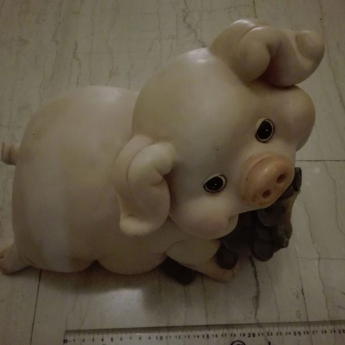 Piggy bank vintage used with gold coins