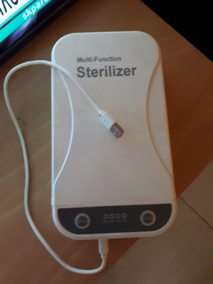 Sterilizer used with blue light and voice alert, USB cable