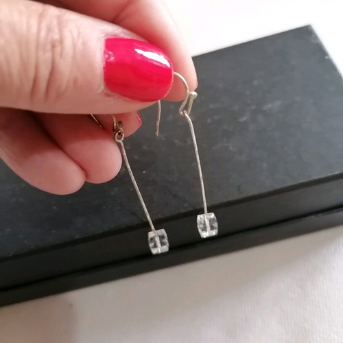Silver earrings with crystal used
