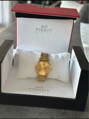 Tissot gold watch