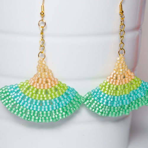 Handmade earrings with green and orange glass beads