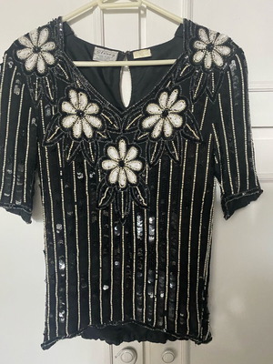 Sequin blouse like new, black and white, sizes M and L