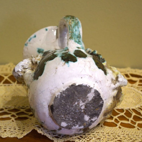 Decorative vintage jug used with mascarons