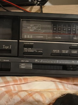 Radio and cassette player used for home amplifier